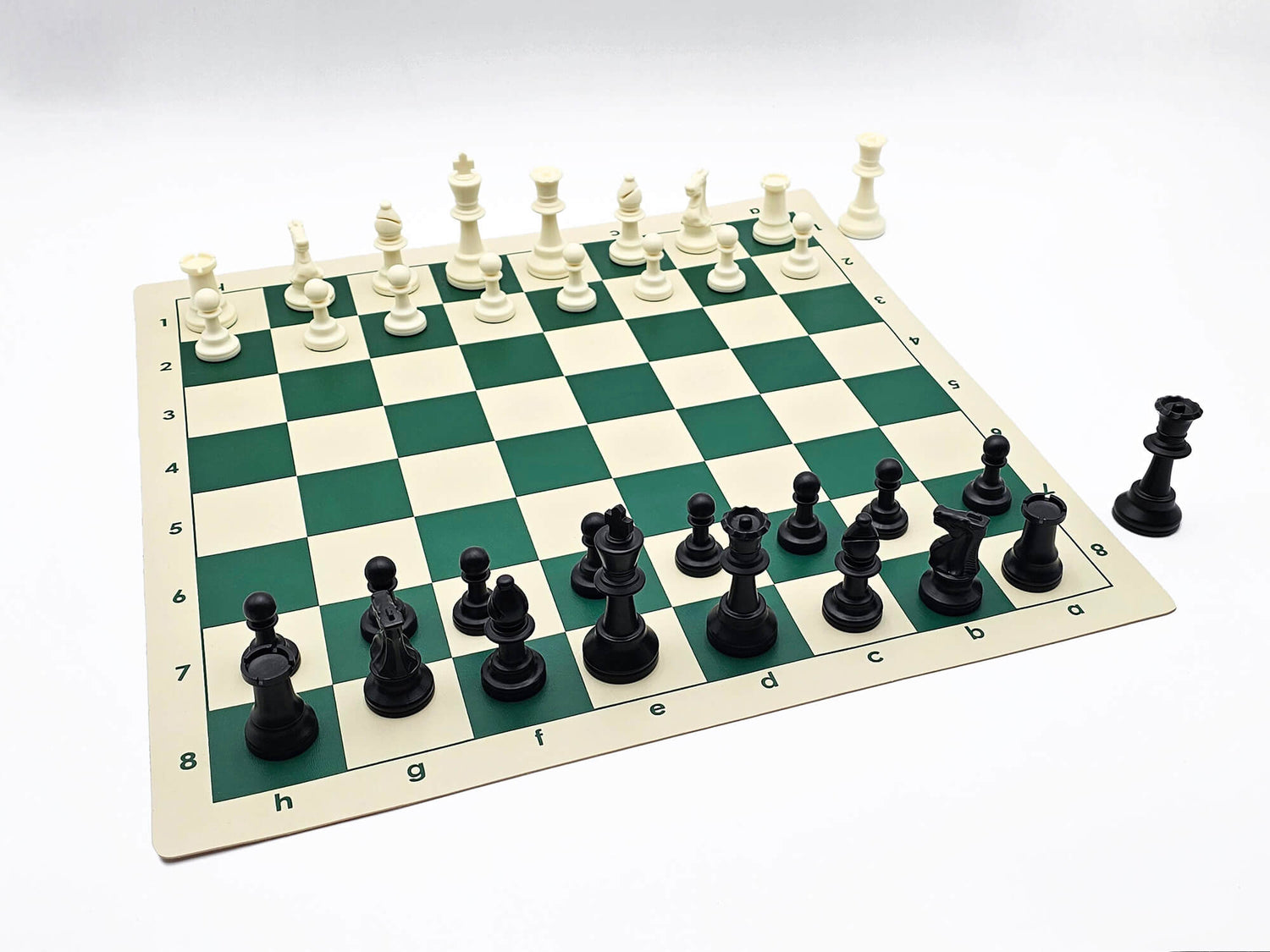 Tournament Chess Set on a Vinyl Chess Board in a Lightbox (Angled Shot from Black&