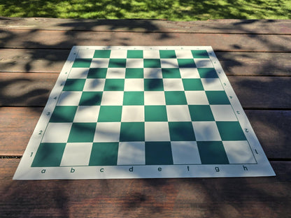 Vinyl Chess Board on Park Bench Outside in Moderate Shadow of Tree Leaves