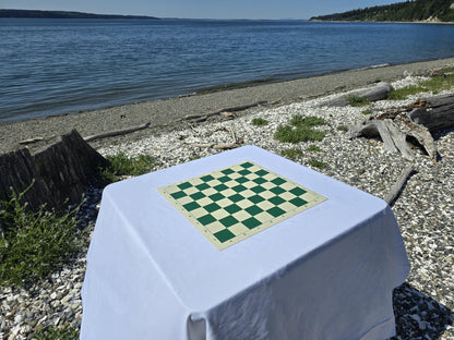 Vinyl Chess Board on a White Cloth Table by the Beach