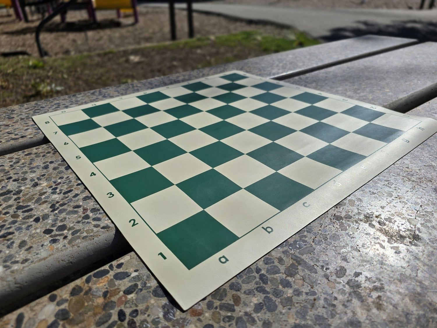 Vinyl Chess Board on Stone Table (Angled Shot from A1)