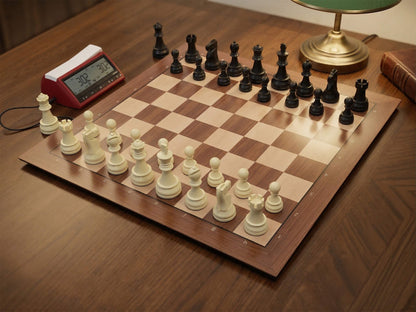Red DGT 3000 chess clock connected to a wooden DGT e-Board with electronic chess pieces on a professional table setup.