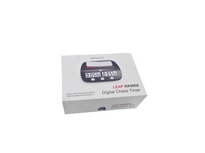 White retail packaging for the Leap KK9908 Digital Chess Timer, featuring a product photo and "FIDE Approved" certification text.