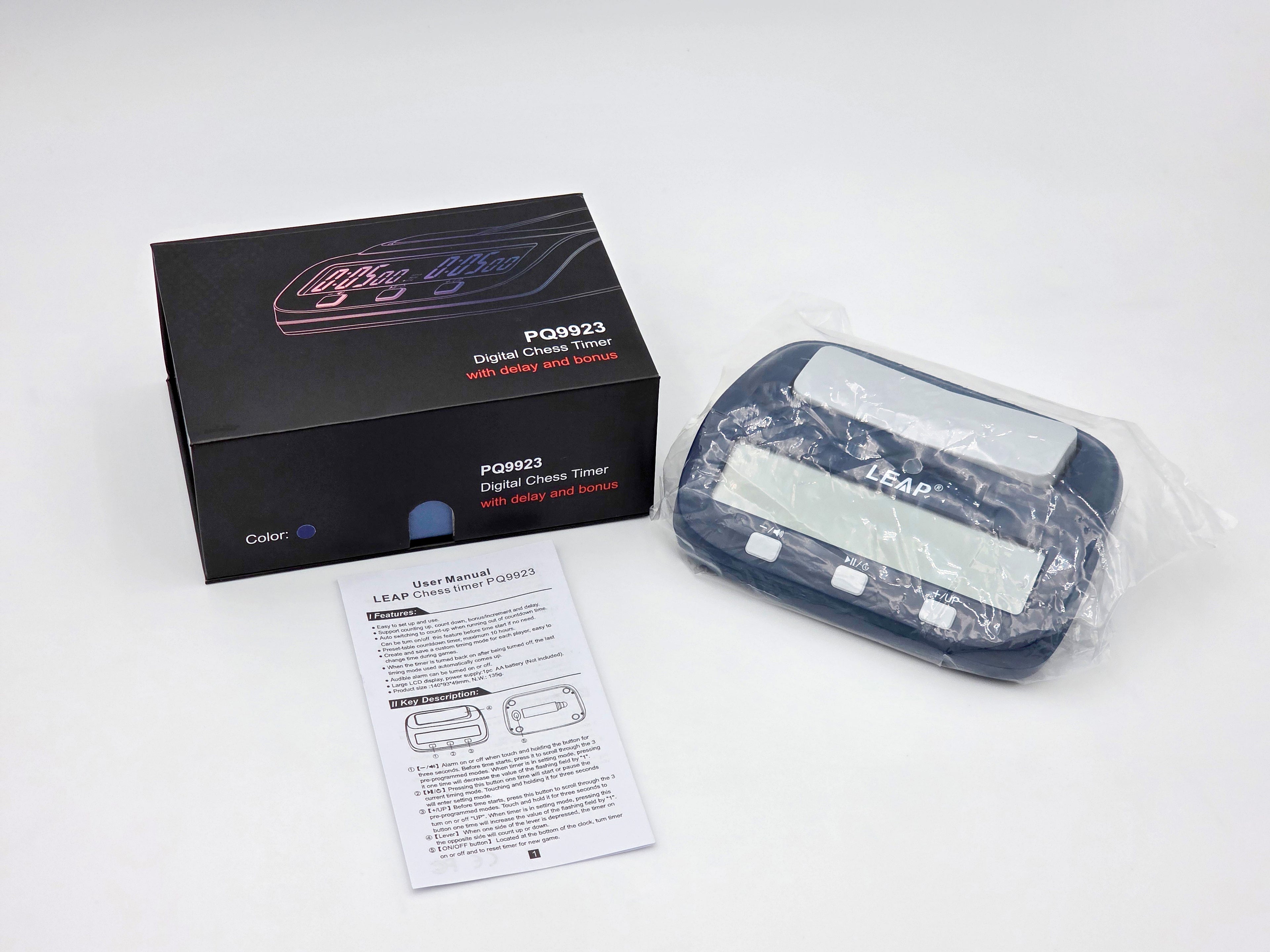 Leap PQ9923 Chess Clock Unboxed Displaying Instruction Manuals and Clock in Pacakage.