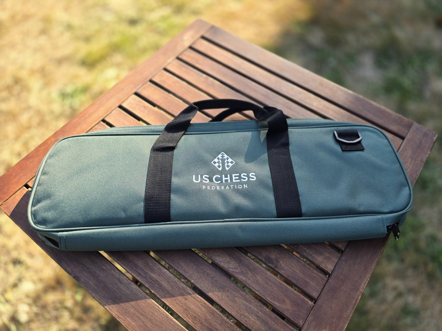 US Chess Federation Deluxe Bag on a Patio Table