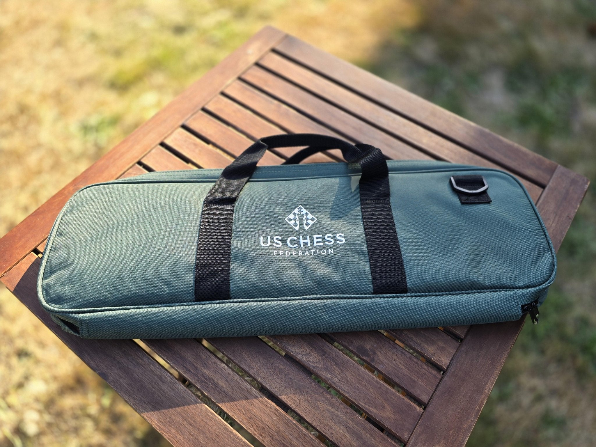 US Chess Federation Deluxe Bag on a Patio Table