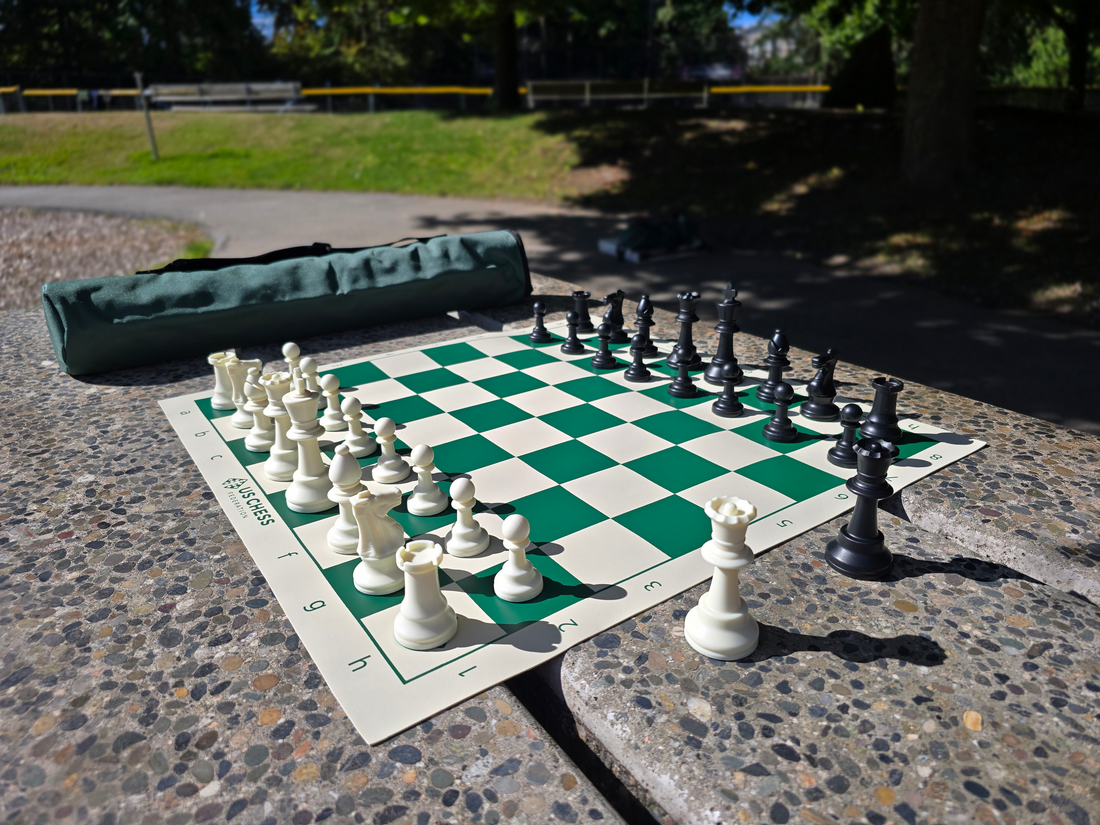 US Chess Federation Tournament Chess Set with Vinyl Chess Board and Quiver Carrying Case on Stone Table
