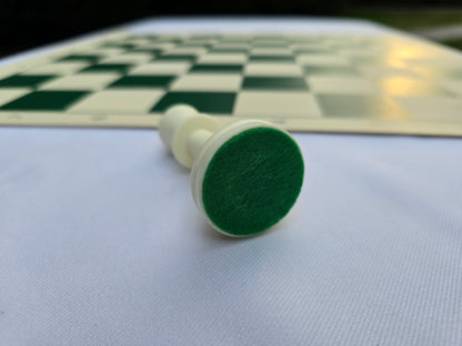 White King Tipped Over on Its Side Displaying Light Green Felted Bottom