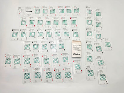 Complete 52 chess opening flashcards set laid out on a white surface with tuck box