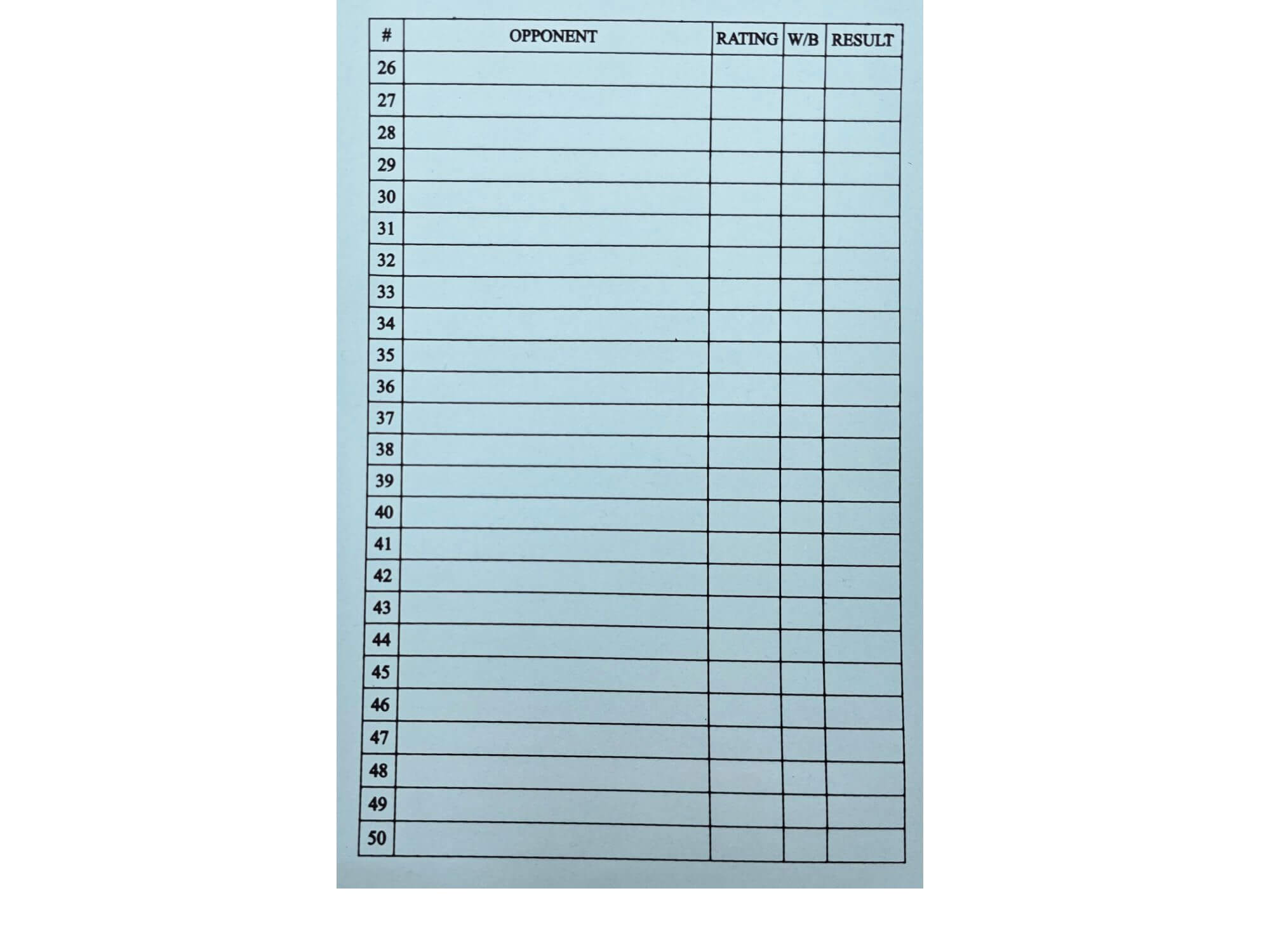 Inside back cover summary page of a chess scorebook featuring a printed table numbered 26 to 50 for keeping track of historical tournament results.