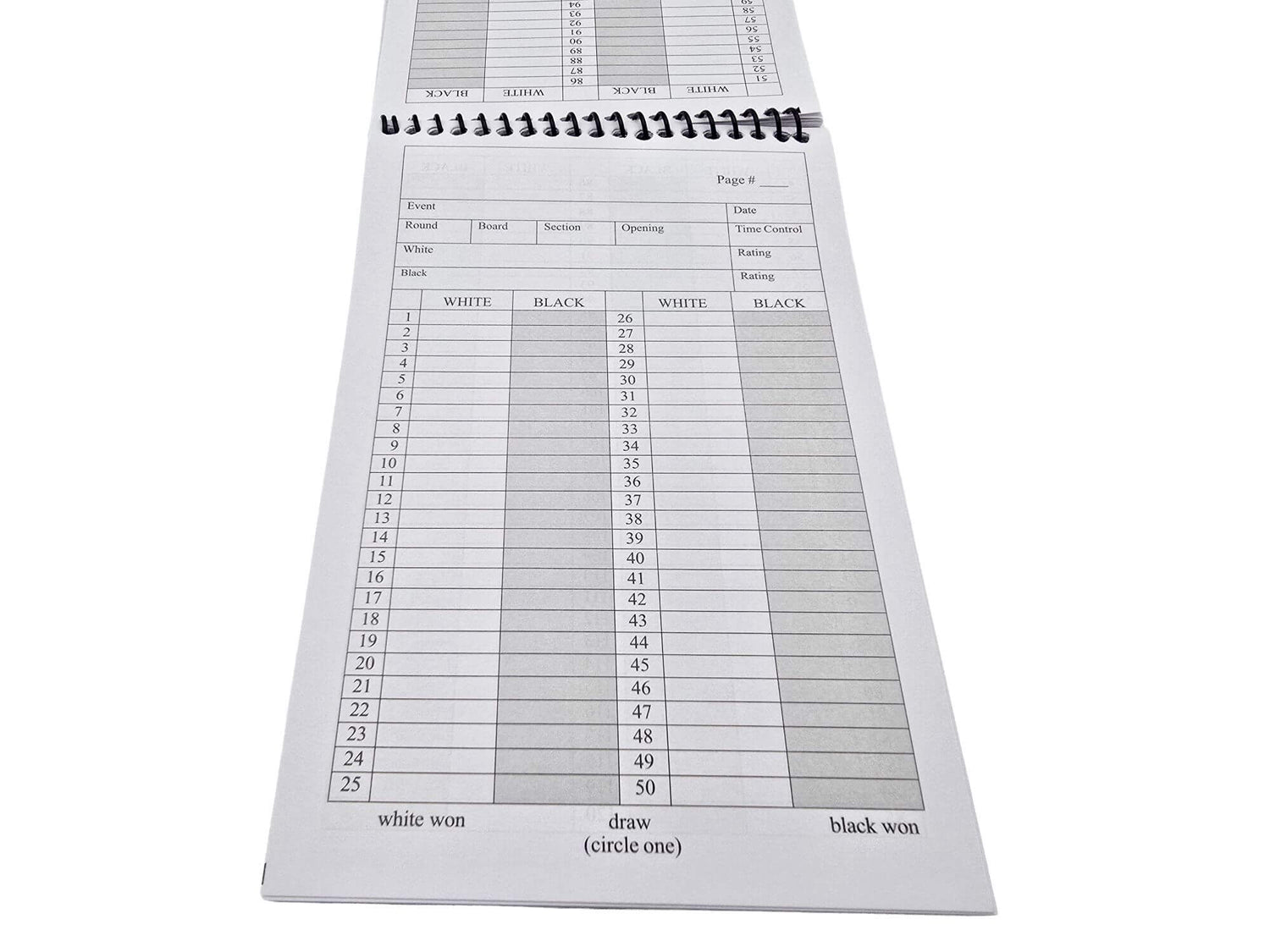 An open spiral-bound chess scorebook showing columns and lined grids formatted for recording notation for moves 1 through 50.