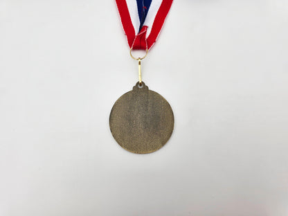The smooth, polished gold back of the Classic Emblem medal, designed for custom engraving and personalized awards.