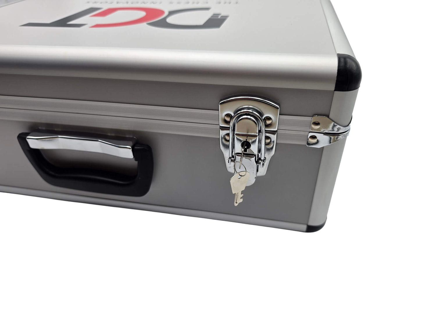 Detailed view of the heavy-duty metal latch, side handle, reinforced corner of the DGT aluminum case as well as keys.