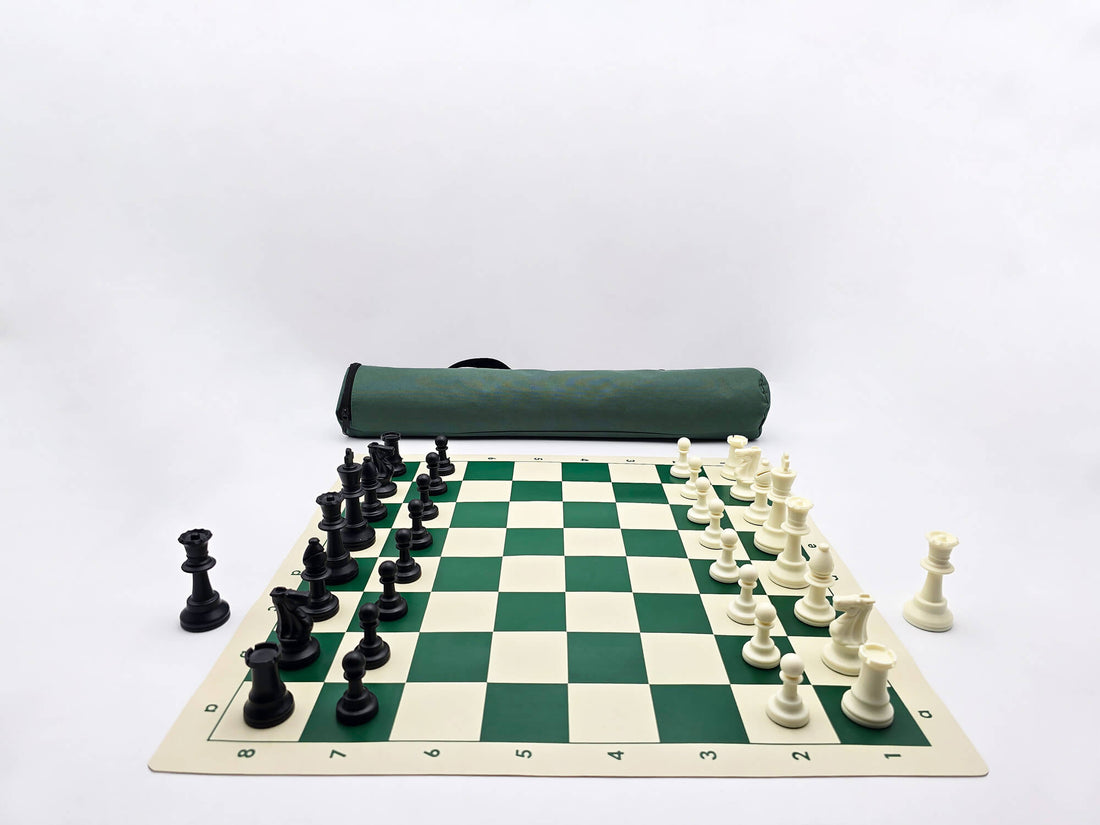 Green and white vinyl roll-up chessboard with black and white plastic Staunton pieces and a forest green quiver-style carrying bag.