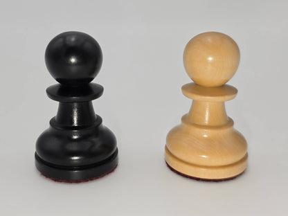 Black and natural wood Judit Polgar chess set pawns standing side by side against a white background.