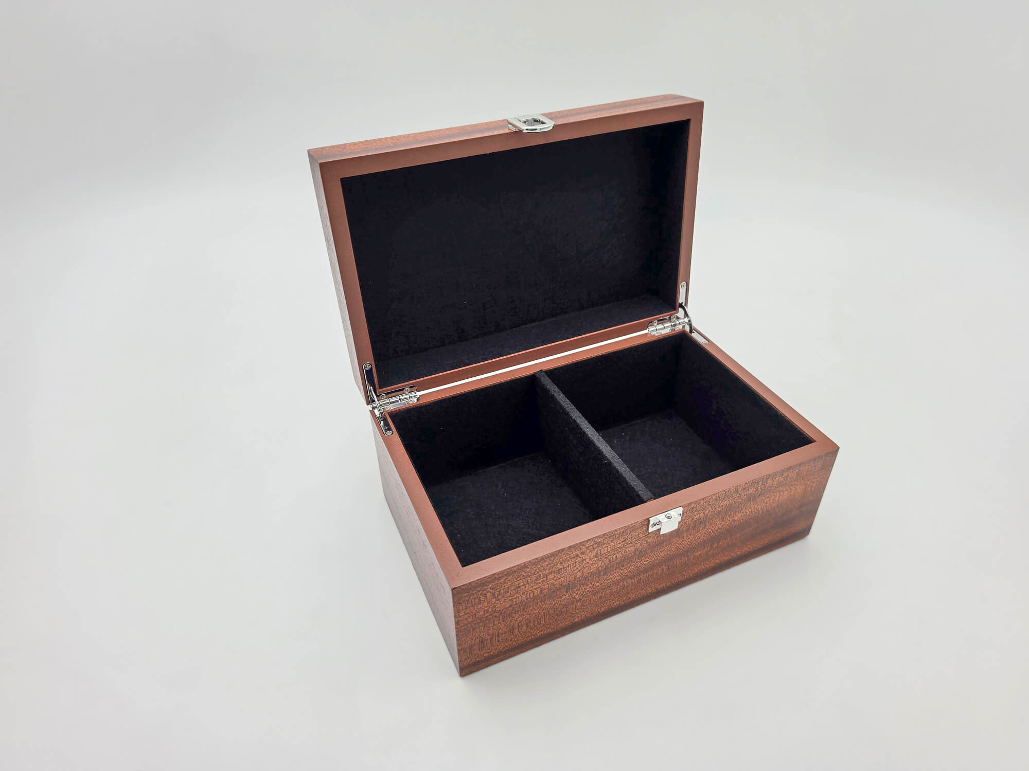 Empty mahogany Monarch wooden chess storage box with black felt lining and two interior compartments.