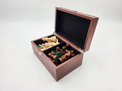 Right angled view of the Monarch mahogany wooden chess box open and filled with chess pieces.