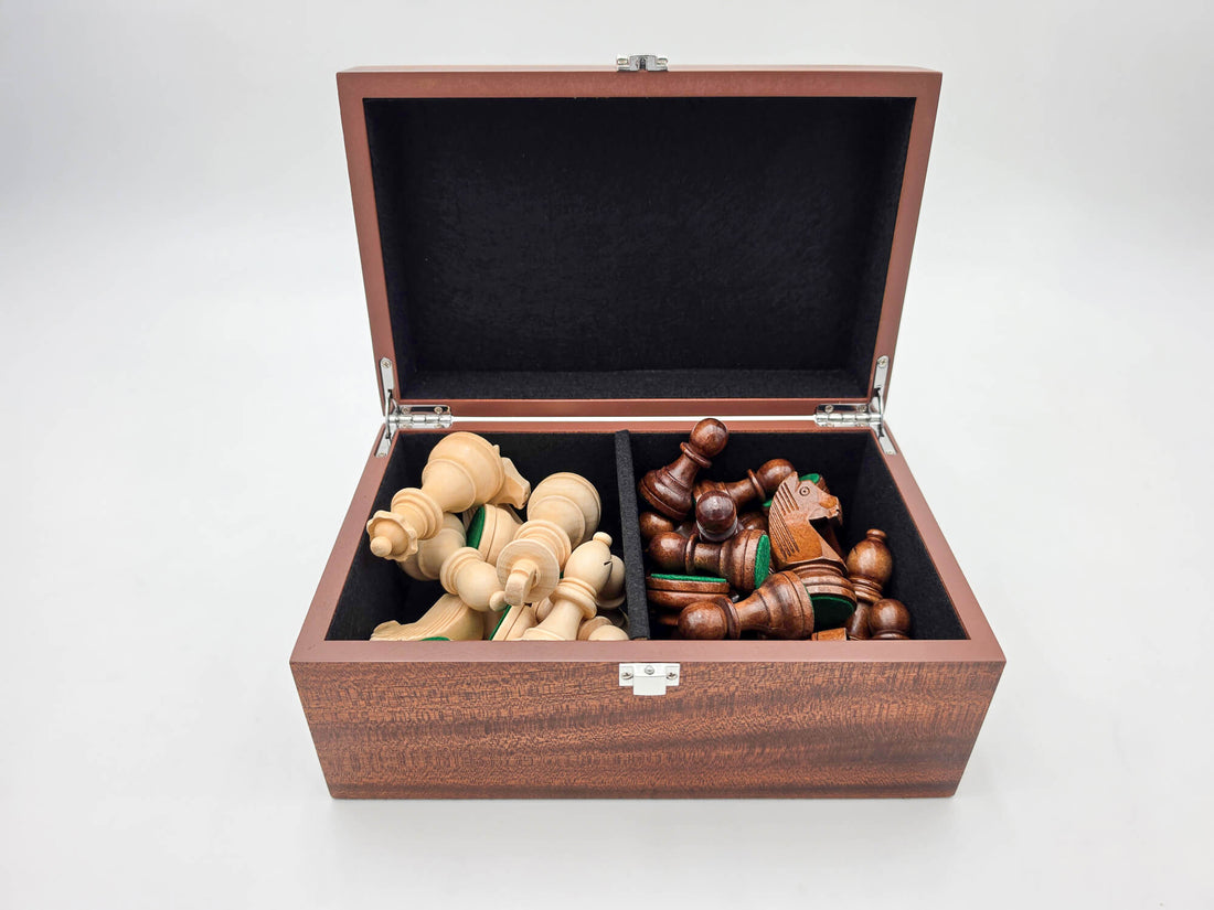 Straight front view of the open Monarch mahogany wooden chess box displaying organized pieces.