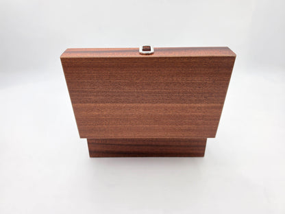 Rear view of the Monarch mahogany wooden chess box with the lid open.