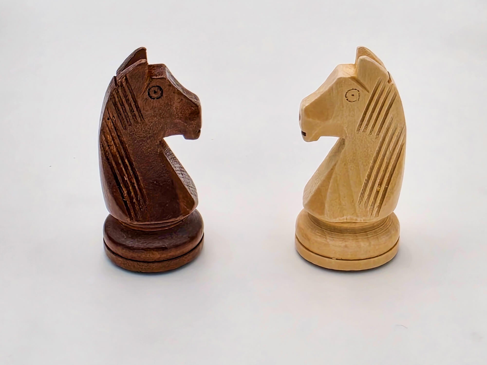 High-definition close-up of the handcrafted dark and light wood Germanic knights, highlighting the unique carving detail.