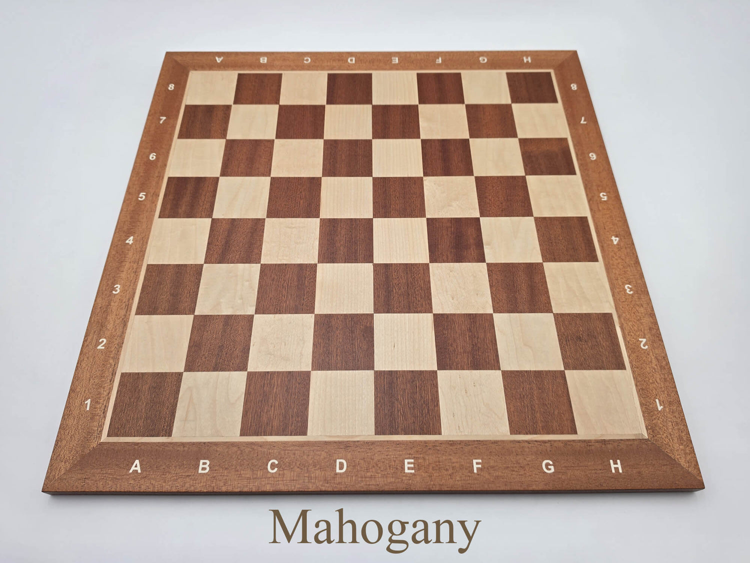 Top-down view of the stunning Monarch Series mahogany and maple chess board, featuring high-contrast 57mm squares and clear algebraic notation.
