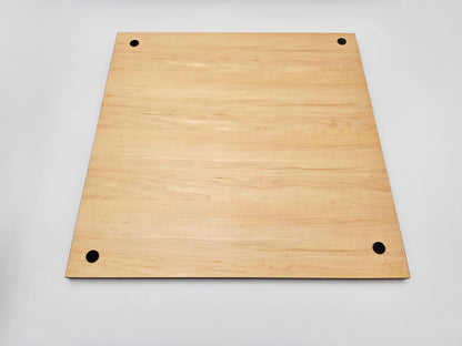 View of the smooth underside of a Monarch wooden chess board, featuring anti-scratch protective corner pads and the robust solid wood frame construction.