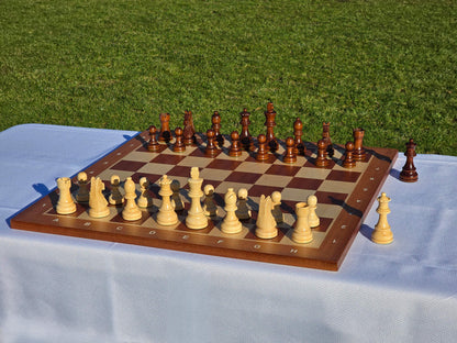 High-angle perspective shot of the Monarch wooden chess set, showcasing the grain of the wood and piece detail.
