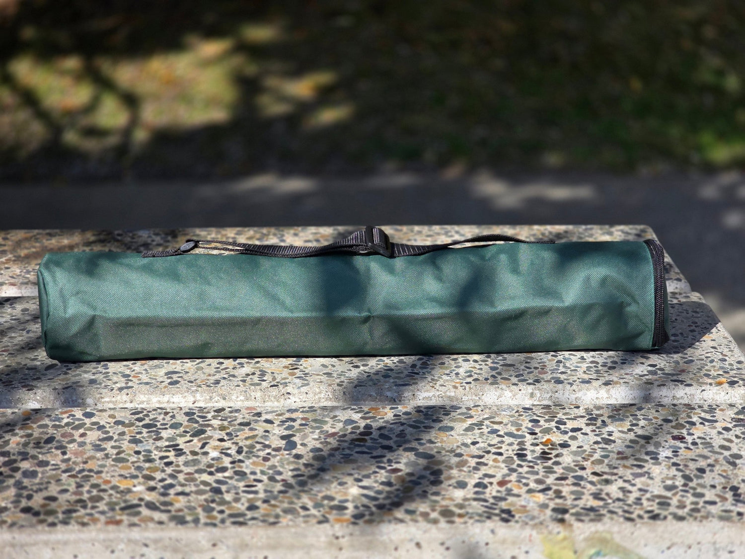 Quiver Carrying Case on Stone Bench